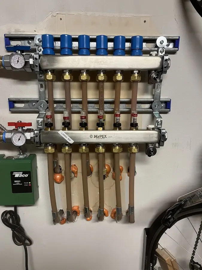 Plumber performing Gas Line Installation at a residential property in Maple Grove