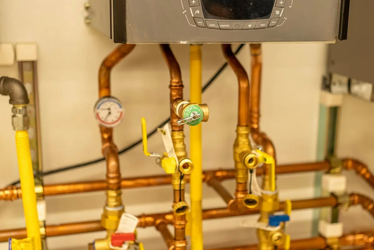 Licensed technician providing Backflow Prevention for a homeowner in Maple Grove